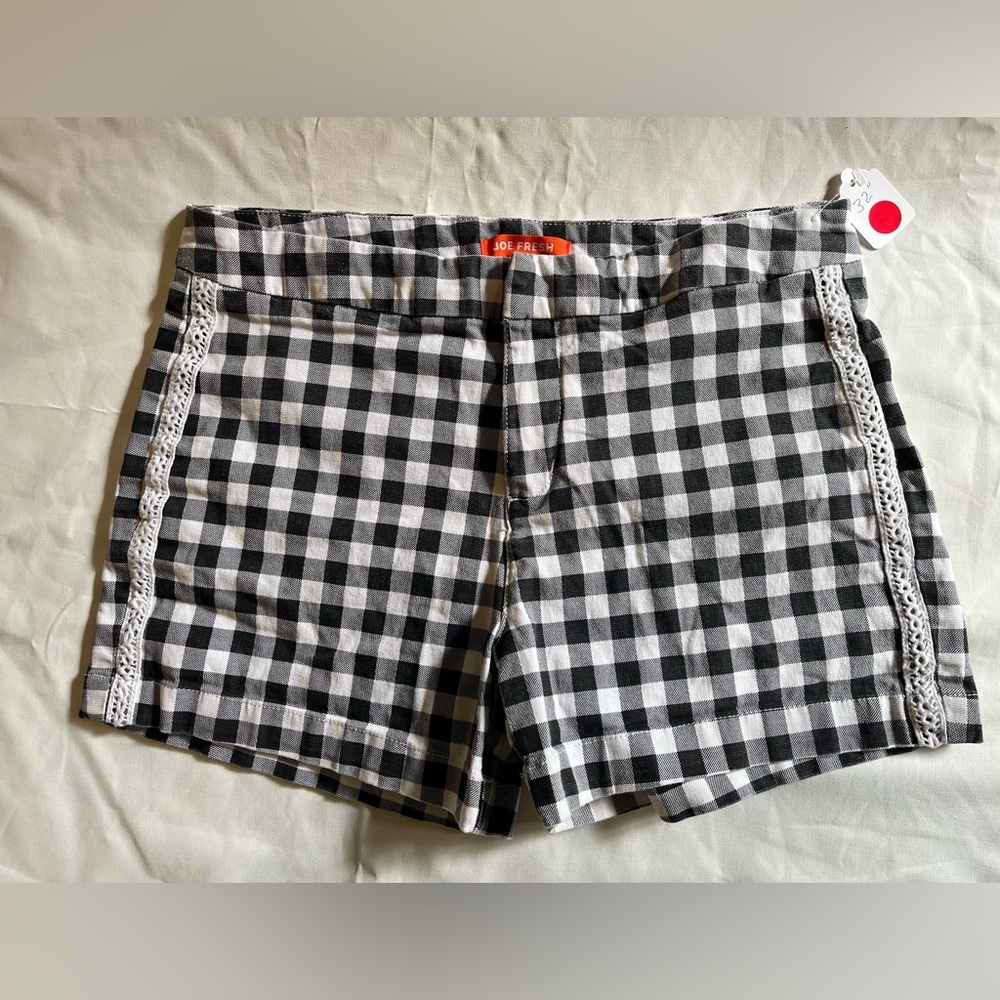 98% cotton black and white check women’s shorts with lace detailing by Joe Fresh